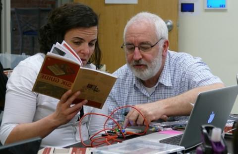 Teachers setting up an Arduino at the 2016 Summit